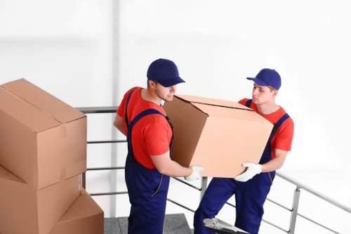 Packed moving boxes and furniture ready for Tottenham removals