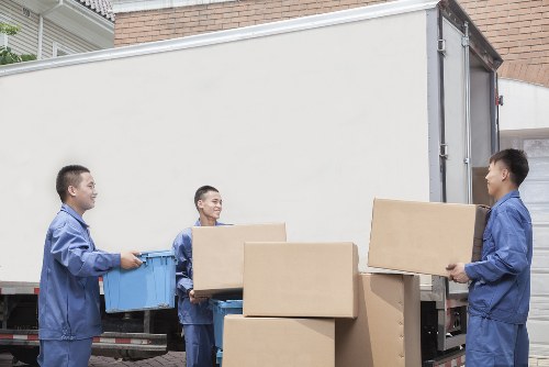 Removal van and packed boxes for Tottenham moving service