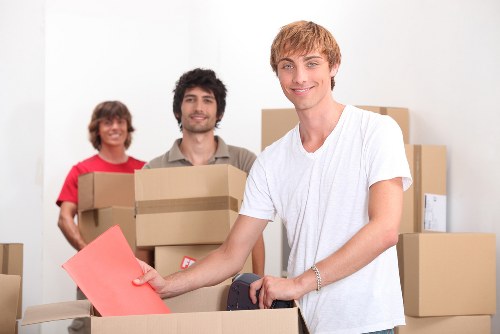Professional movers loading a van during a Tottenham home relocation